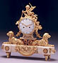 Gilt bronze figural dog clock
